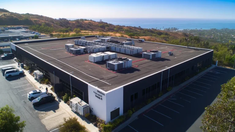 A commercial roof on a call center in a location similar to Malibu with a color highlight aesthetic (AI image)