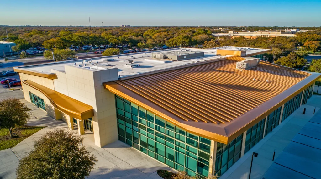 A commercial roof on a community recreation center in a location similar to San Antonio with a solid gold aesthetic (AI image)