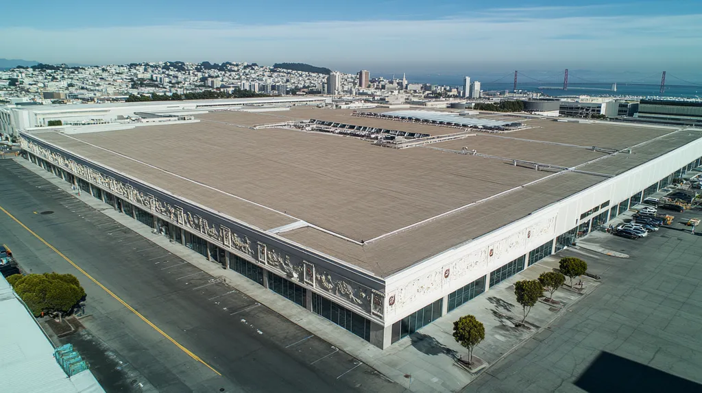 A commercial roof on a convention center in a location similar to San Francisco with an urban context aesthetic (AI image)