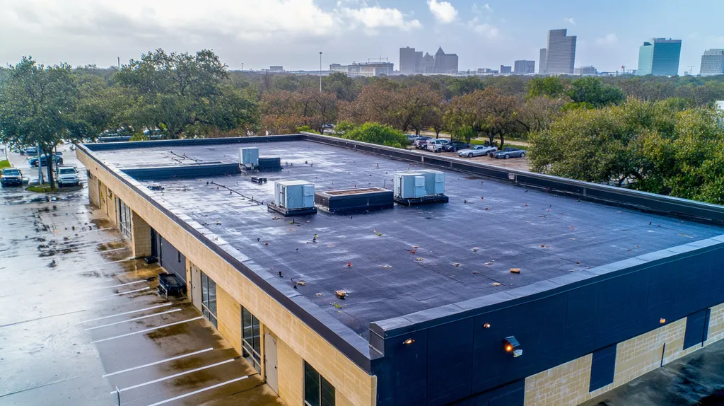 A commercial roof on a bank in a location similar to Houston with a rainy day aesthetic (AI image)