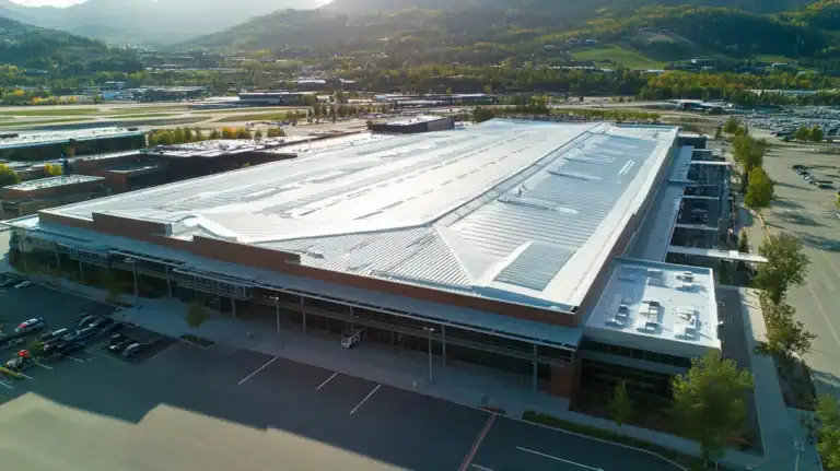 A commercial roof on an airport terminal in a location similar to Aspen with an urban context aesthetic (AI image)