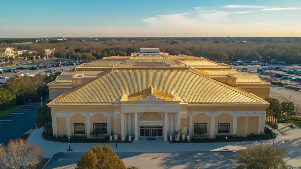 A commercial roof on a convention center in a location similar to Charleston with a solid gold aesthetic (AI image)