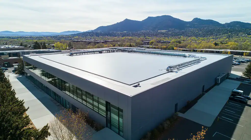 A commercial roof on a data center in a location similar to Boulder with a futuristic aesthetic (AI image)