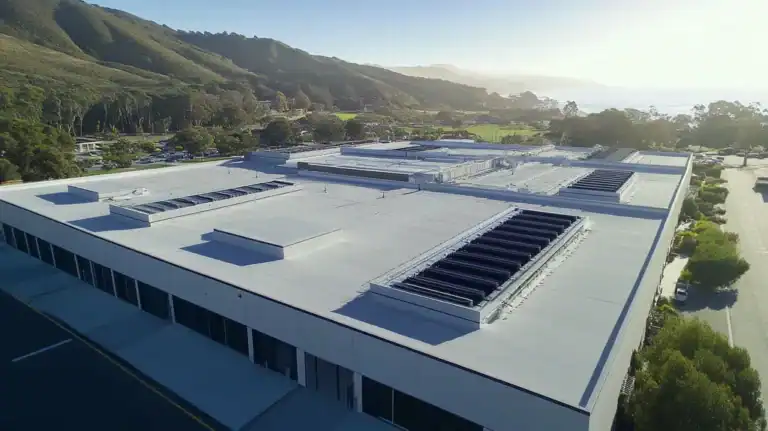 A commercial roof on a distribution center in a location similar to Big Sur with an urban context aesthetic (AI image)