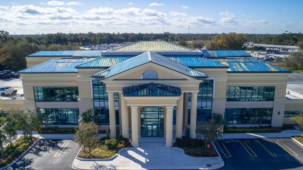 A commercial roof on a mid-rise in a location similar to Tampa with a stained glass style aesthetic (AI image)